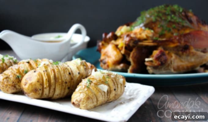 Golden Fan-Cut Potatoes 16 A close-up shot demonstrating how to make Hasselback potatoes, highlighting the precise cuts and fanned-out appearance before baking.