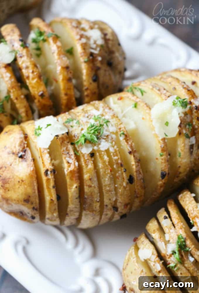 Golden Fan-Cut Potatoes 6 A close-up of easy hasselback potatoes, beautifully fanned out and golden brown, ready to be served as a delightful side dish.