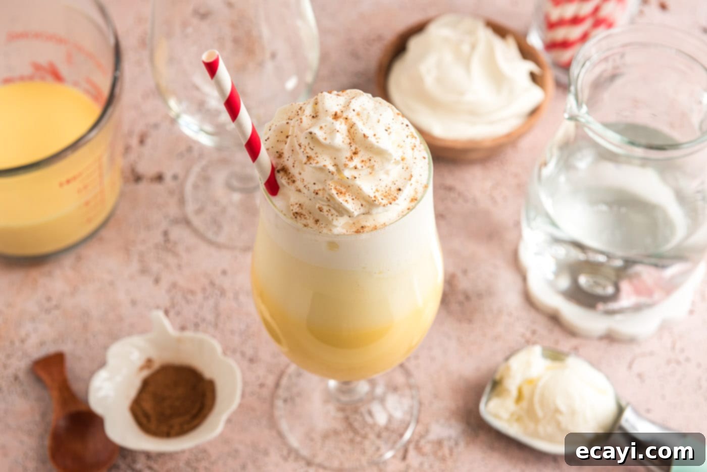 Creamy Eggnog Delight 8 A finished eggnog ice cream float adorned with whipped cream and festive sprinkles