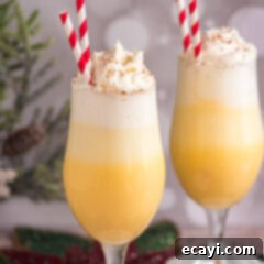 Creamy Eggnog Delight 10 A festive Eggnog Float with another one to the side, ready for holiday enjoyment