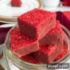 Decadent Red Velvet Fudge 8 A perfectly portioned Red Velvet Fudge square, rich in color and texture, ready to be enjoyed.