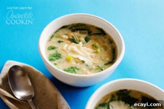 Effortless White Bean Soup 3 A simple white bean soup recipe in a bowl, garnished with a sprinkle of pepper.
