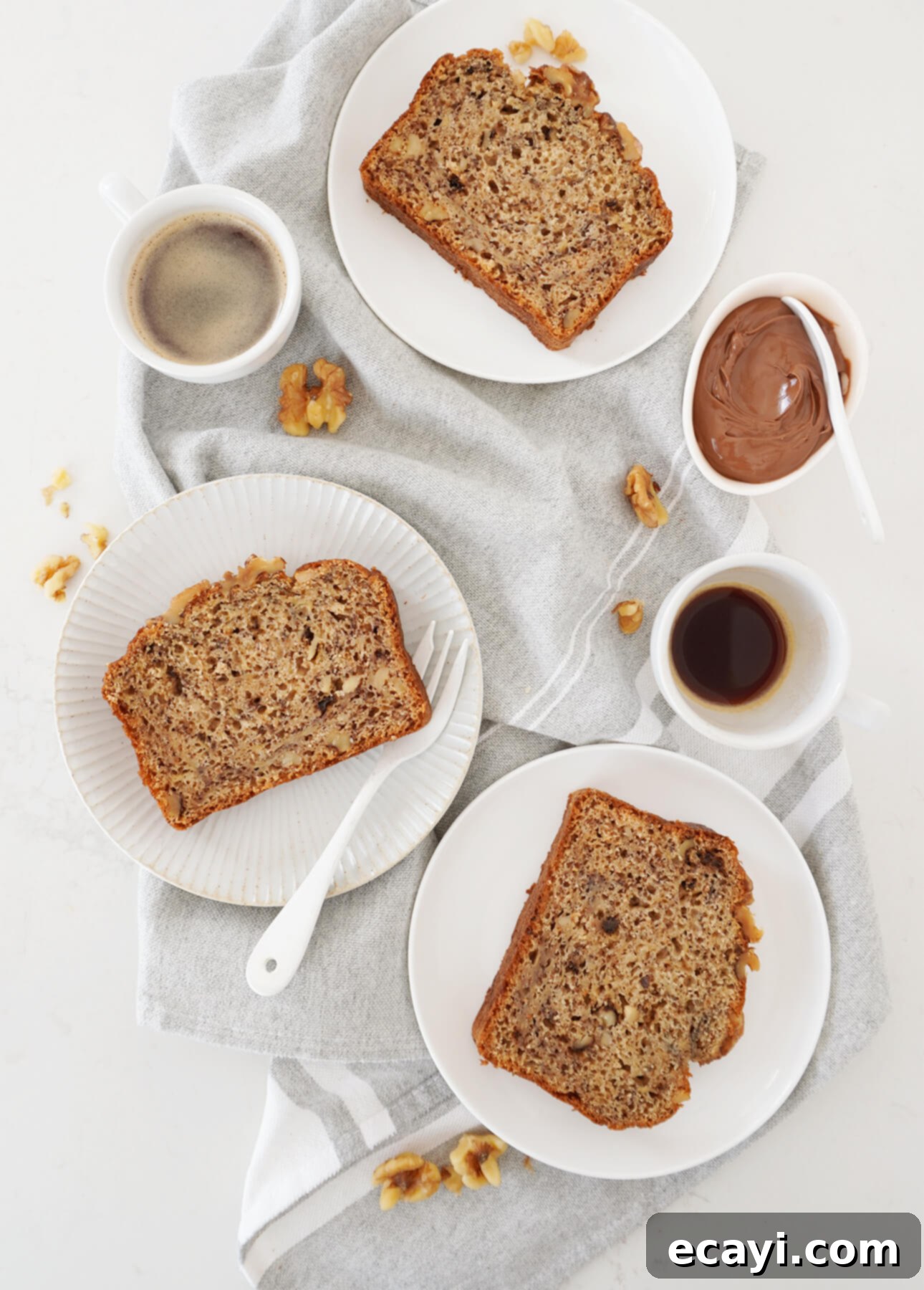 The Secret to Ultimate Banana Bread 7 Slices of banana bread with hazelnut spread and coffee // FoodNouveau.com