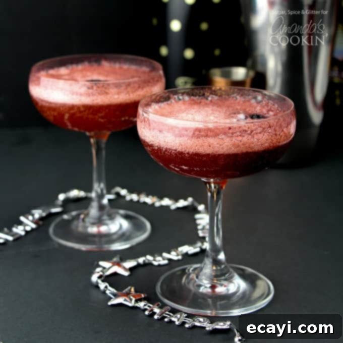 No matter what the celebration, these gorgeous champagne cocktails are ideal for any occasion. New Year's Eve, weddings, anniversaries, promotions and more! #newyears #partydrinks #champagne #rum #blackberries #cocktails #valentine #valentinesday #darkrum #anniversary Champagne cocktails in glasses with blackberries
