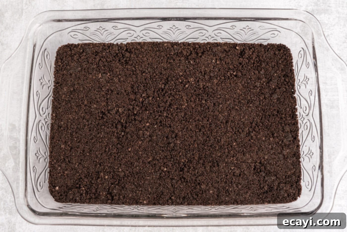 No-Bake Mint Chocolate Lasagna 6 Oreo cookie crust in a baking pan