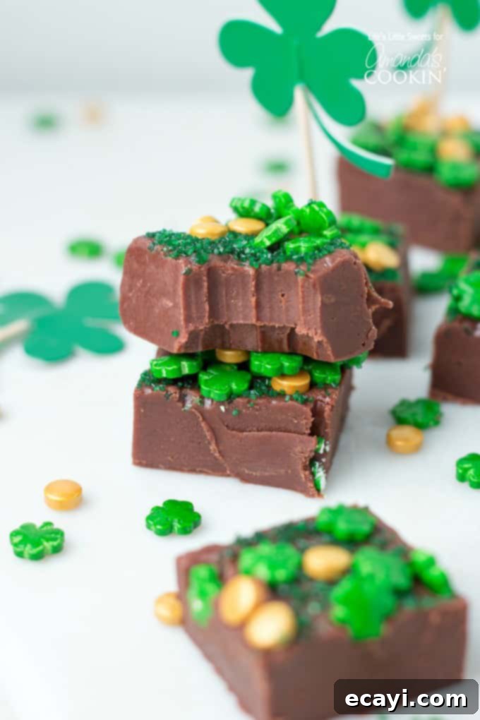 This Baileys Irish Cream Chocolate Fudge is a decadent, flavorful, and rich chocolate fudge recipe infused with Baileys Irish Cream. You'll love this one! #fudge #stpatricksday #chocolate #chocolatefudge #baileys #irish #stpattysday #dessertrecipes #candy Baileys Irish Cream Chocolate Fudge
