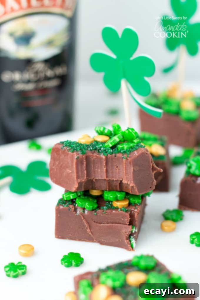 This Baileys Irish Cream Chocolate Fudge is a decadent, flavorful, and rich chocolate fudge recipe infused with Baileys Irish Cream. You'll love this one! #fudge #stpatricksday #chocolate #chocolatefudge #baileys #irish #stpattysday #dessertrecipes #candy Baileys Irish Cream Chocolate Fudge stacked