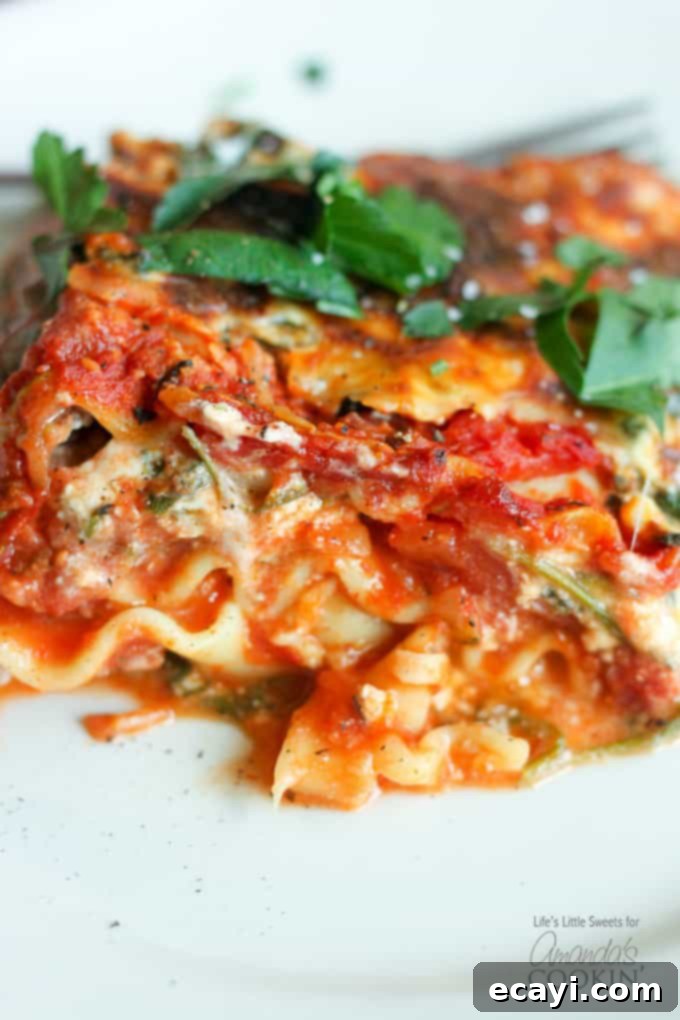 Garden Vegetable Lasagna 6 A close up of veggie lasagna on a white plate.