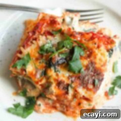 Garden Vegetable Lasagna 8 overhead photo of veggie lasagna on a white plate