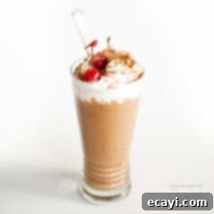 Whip Up Delicious Nice Cream Milkshakes 5 chocolate shake with cherry garnish