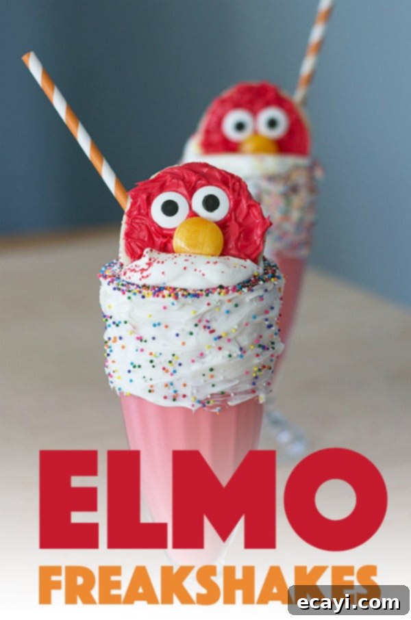 These Elmo Freakshakes are super simple and full of character! A simple milkshake recipe turned into a fun and out-of-the-box freakshake! #elmo #sesamestreet #birthdayparty #milkshake #freakshakes #icecream Elmo Freakshakes!