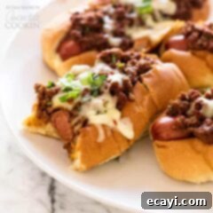 Chili Dog Bake 2 chili dogs on a white plate