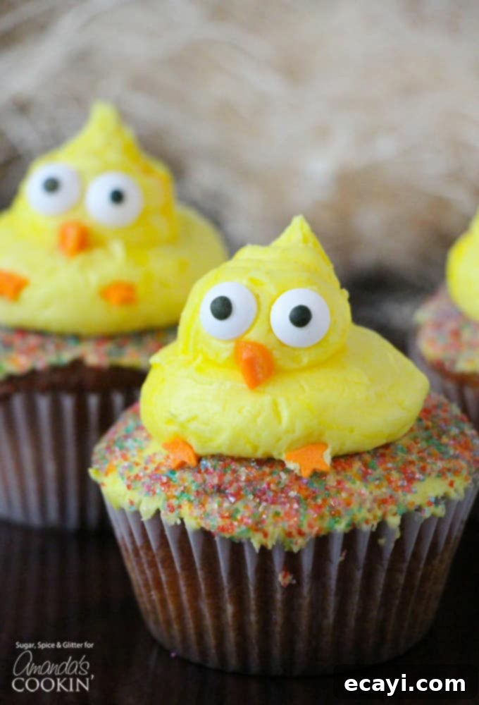 These cute Easter Chick Cupcakes are a quick & easy Easter dessert, fit to feed a crowd! Great for a holiday gathering or as a fun recipe to do with kids. #cupcakes #easter #easterdessert #spring #cupcakerecipes #easterrecipes Adorable Easter themed cupcakes