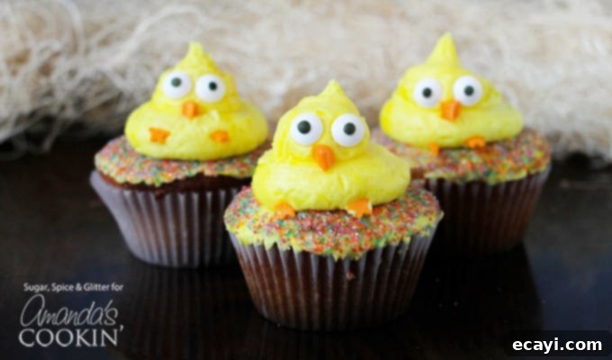 These cute Easter Chick Cupcakes are a quick & easy Easter dessert, fit to feed a crowd! Great for a holiday gathering or as a fun recipe to do with kids. #cupcakes #easter #easterdessert #spring #cupcakerecipes #easterrecipes Easter Chick Cupcakes