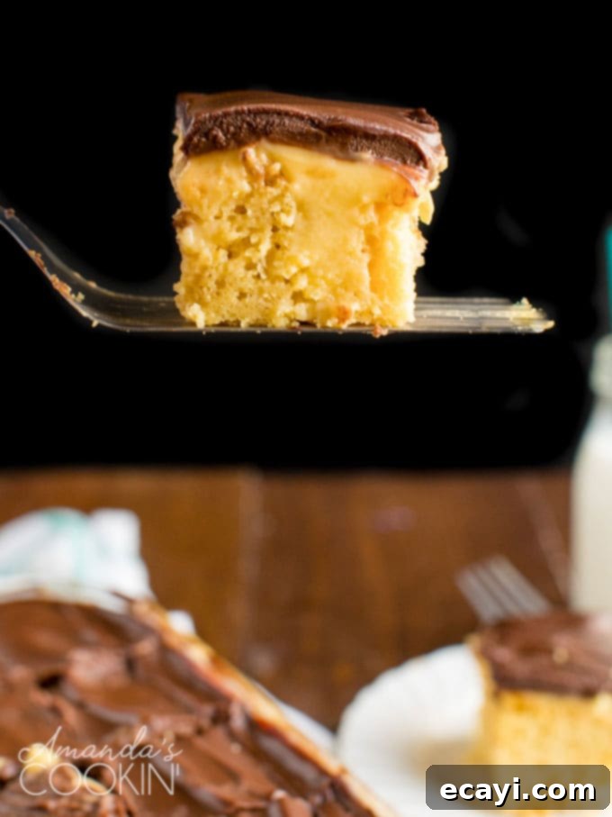 Boston Cream Infusion Dream 6 spatula holding a slice of poke cake