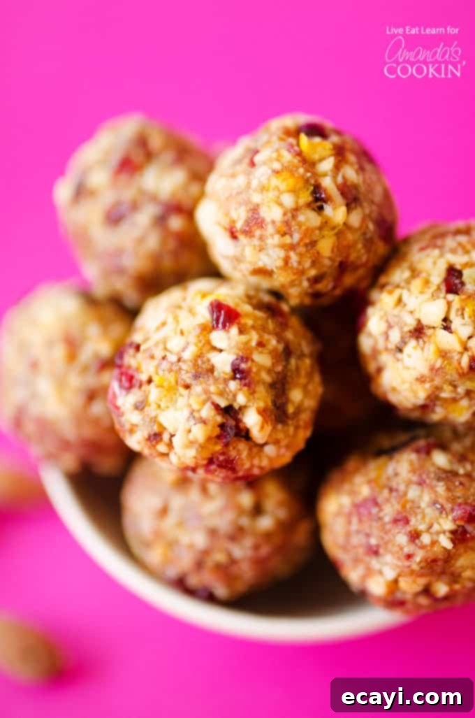 Within just 5 minutes you have delightfully sweet and satisfying cranberry breakfast bites to power you through your morning. A bowl filled with delicious homemade cranberry breakfast bites, highlighting their wholesome texture and vibrant color. Perfect for a quick and healthy breakfast or snack.