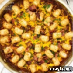 Loaded BBQ Chicken Tater Tot Skillet 3 tater tot casserole garnished with bacon