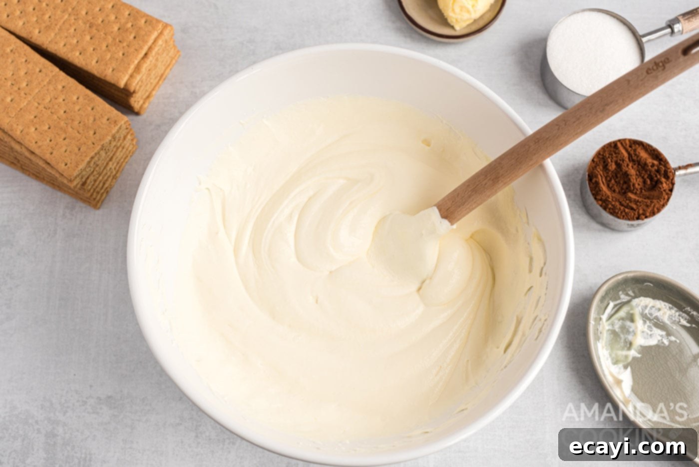 Decadent Eclair Delight 7 pudding mixed with whipped topping in a bowl, showing a creamy, light texture
