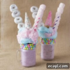 Whimsical Unicorn Freakshakes 12 two purple milkshakes with donuts and marshmallows