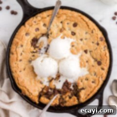 Decadent Skillet Chocolate Chip Cookie 11 A delicious homemade Skillet Chocolate Chip Cookie with gooey center