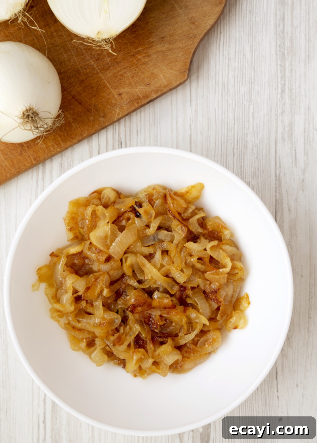 Perfect Homemade French Onion Soup 5 Caramelized onions that will be used to make Classic French Onion Soup // FoodNouveau.com