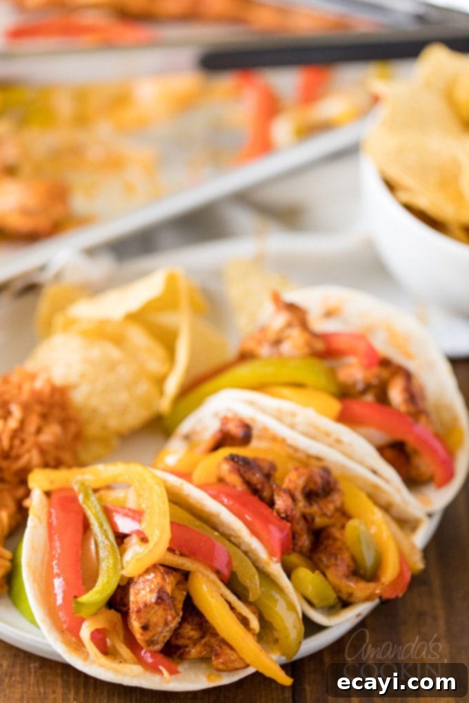 One-Pan Chicken Fajitas 2 Plate of sizzling chicken and vegetable fajitas, ready to eat