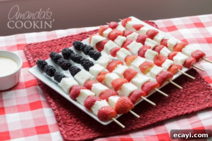 These fruit kabobs are artfully arranged to mimic the American flag, making them a perfect patriotic party addition. Beautifully arranged fruit kabobs designed to look like the American flag