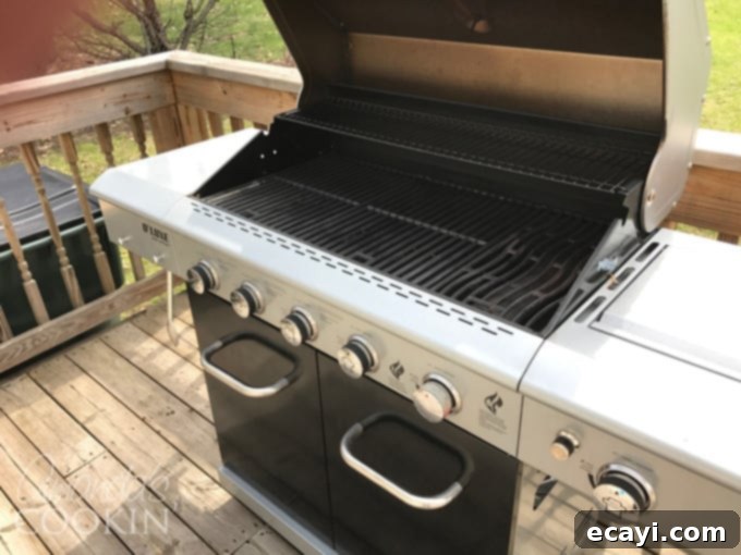 Get ready for grilling season with this step by step photo guide on how to clean your gas grill. Easy instructions that will have you grilling in no time! #cleaningyourgrill #howtocleangasgrill #gasgrill #grilling #clean #howtoclean #laborday #memorialday #barbecues #summer #amandascookin cleaning your gas grill for the summer season