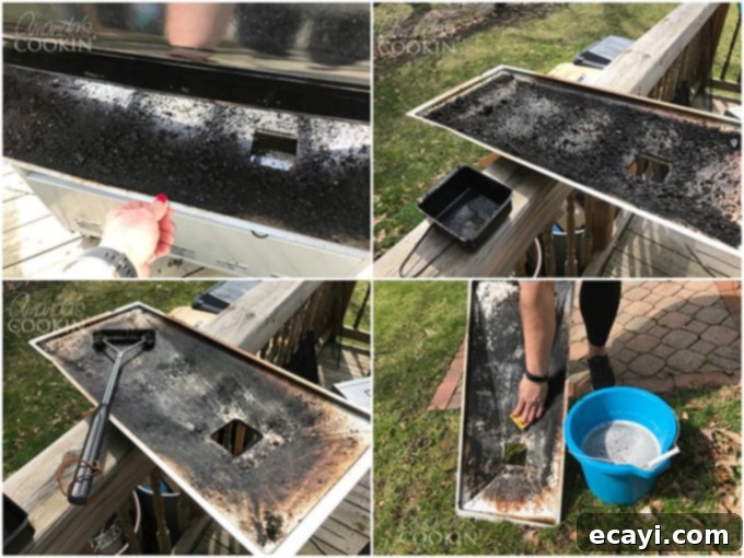 The Gas Grill Deep Clean: Restore Its Shine & Performance 7 cleaning the bottom tray of a grill