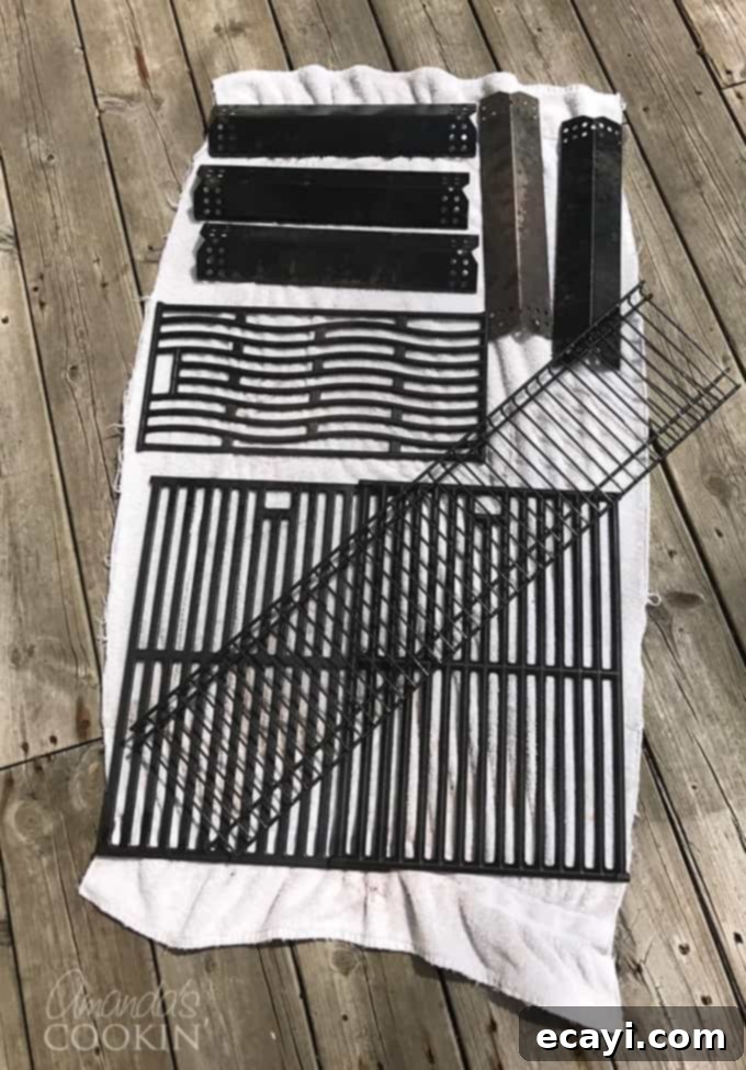 The Gas Grill Deep Clean: Restore Its Shine & Performance 8 grill parts drying on towel