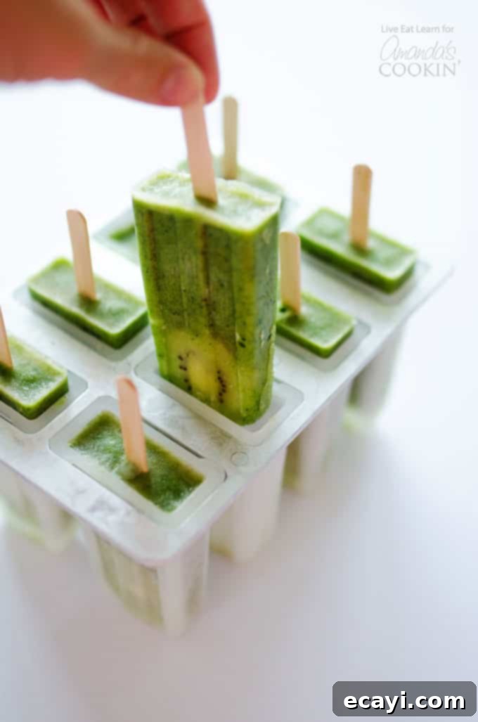 Homemade Green Smoothie Popsicles in a mold Green smoothie popsicles in popsicle mold