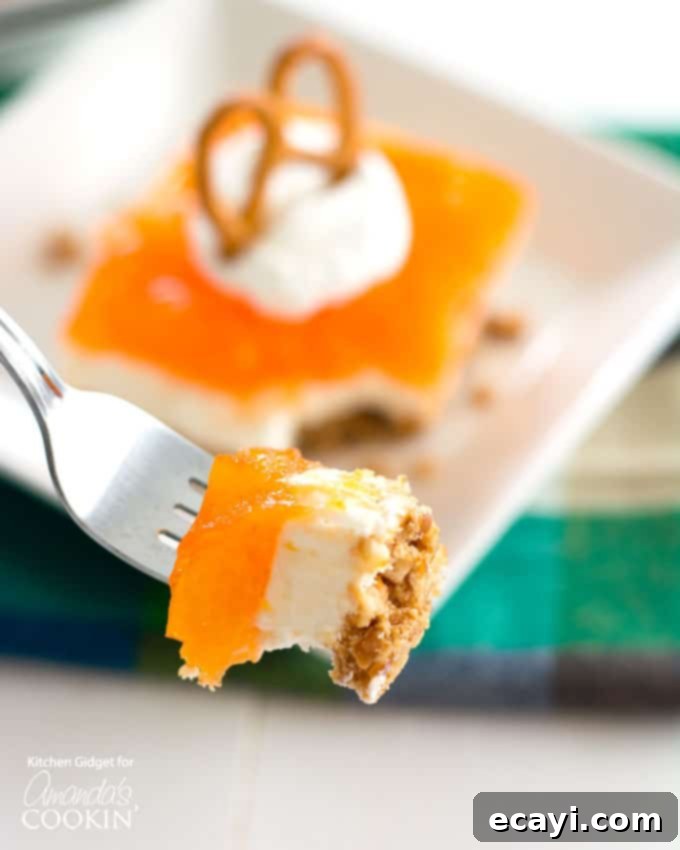 Sunshine Mandarin Gelatin Dessert 4 Mandarin Orange Pretzel Salad one-pan dessert recipe!
