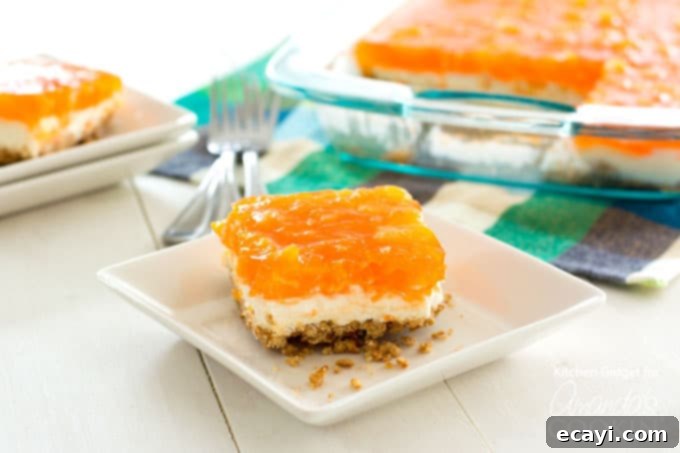 Sunshine Mandarin Gelatin Dessert 5 Indulge your guests with this Mandarin Orange Pretzel Salad dessert!