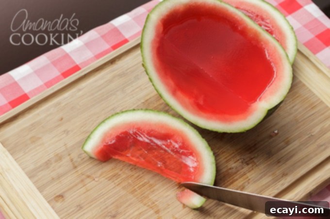 These Watermelon Jello Shots are a party favorite! Jello shots are perfect to bring to BBQ's, potlucks, camping or any type of gathering. cut the excess tips off the rind