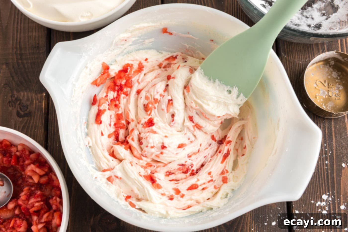 Blush Berry Bliss 8 Strawberry and cream cheese mixture in a bowl, showing the chunks of strawberry blended in.