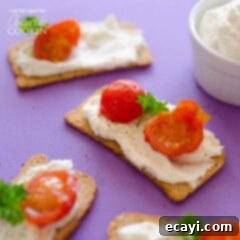 Creamy Ricotta Feta Dip 2 Ricotta Whipped Feta served on crackers with fresh garnishes