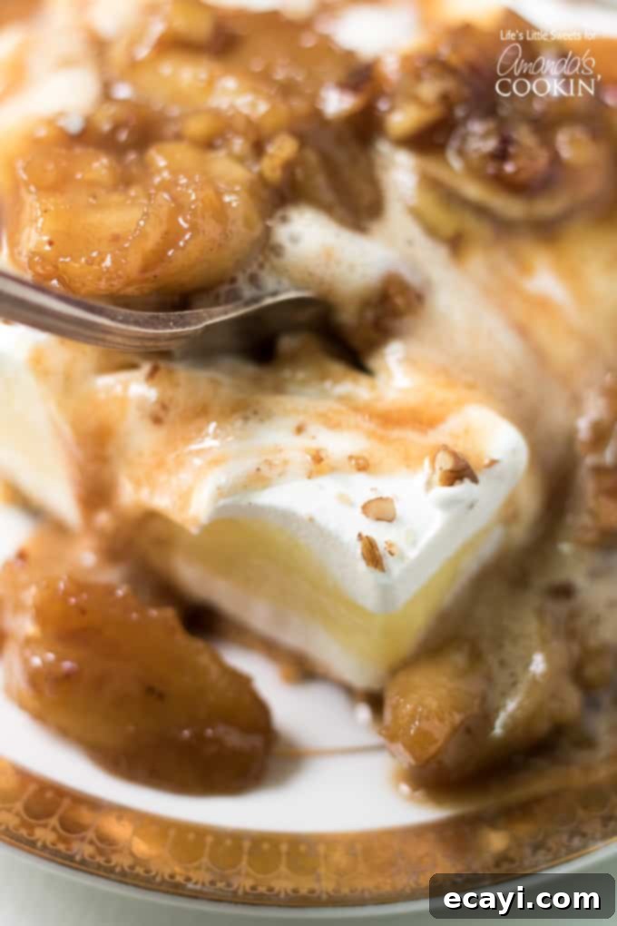 The exquisite pairing of warm Bananas Foster sauce with cold Banana Cream Lush. Warm caramel sauce atop chilled banana cream lush