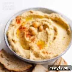 Baba Ganoush and Hummus Sampler 2 Close-up of creamy Baba Ganoush Hummus in a bowl