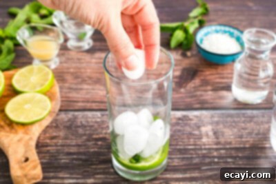 Island Coconut Dream 11 adding ice to glass