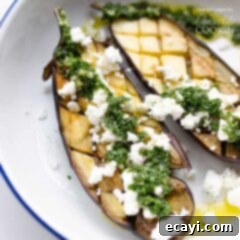 Roasted Eggplant with Bright Mint Dressing 5 eggplant on a plate with feta cheese