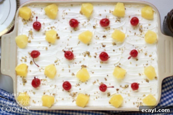 Decadent Banana Split Treat 5 Banana Split Dessert Lush - A close-up of a single slice, showing all the layers