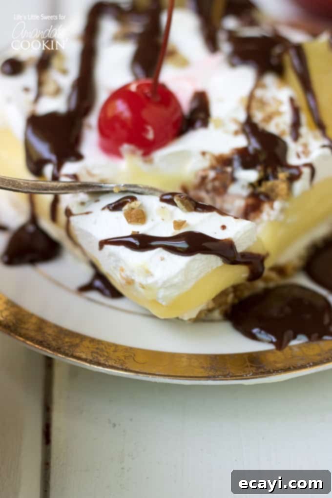 Decadent Banana Split Treat 6 Indulge with this banana split dessert today! - A top-down view of the dessert in the pan