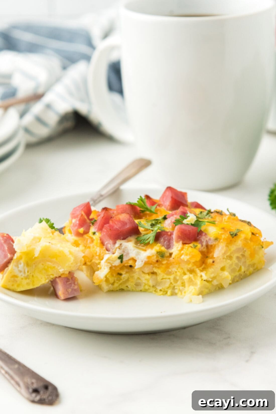 Savory Ham and Cheese Morning Bake 2 Breakfast casserole on a plate, ready to be enjoyed