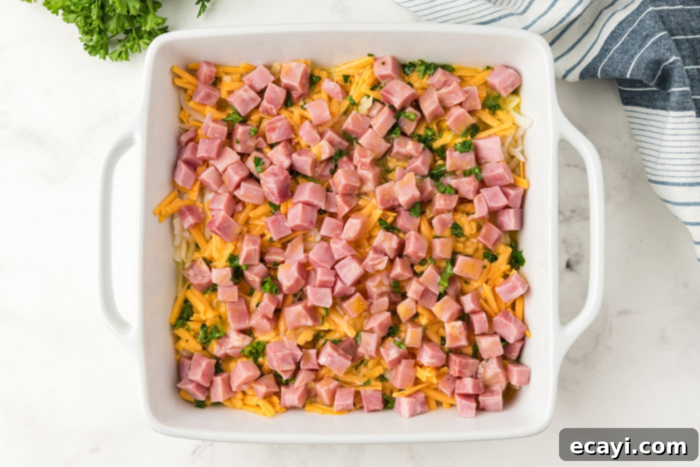 Savory Ham and Cheese Morning Bake 9 Breakfast casserole in a dish, ready for baking