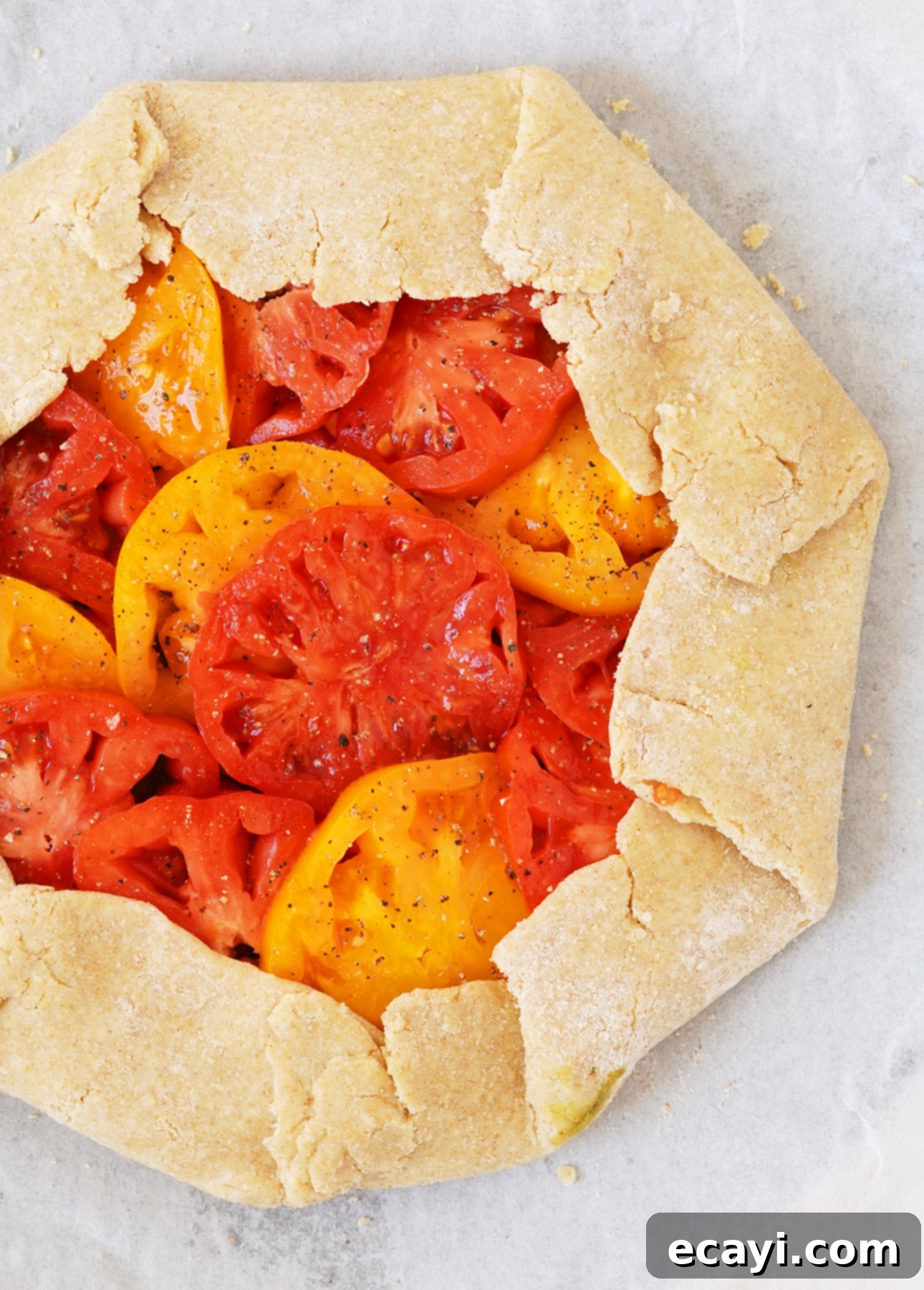 Vibrant Heirloom Tomato Crostata with Handcrafted Pesto 3 Heirloom Tomato Crostata with Homemade Pesto // FoodNouveau.com