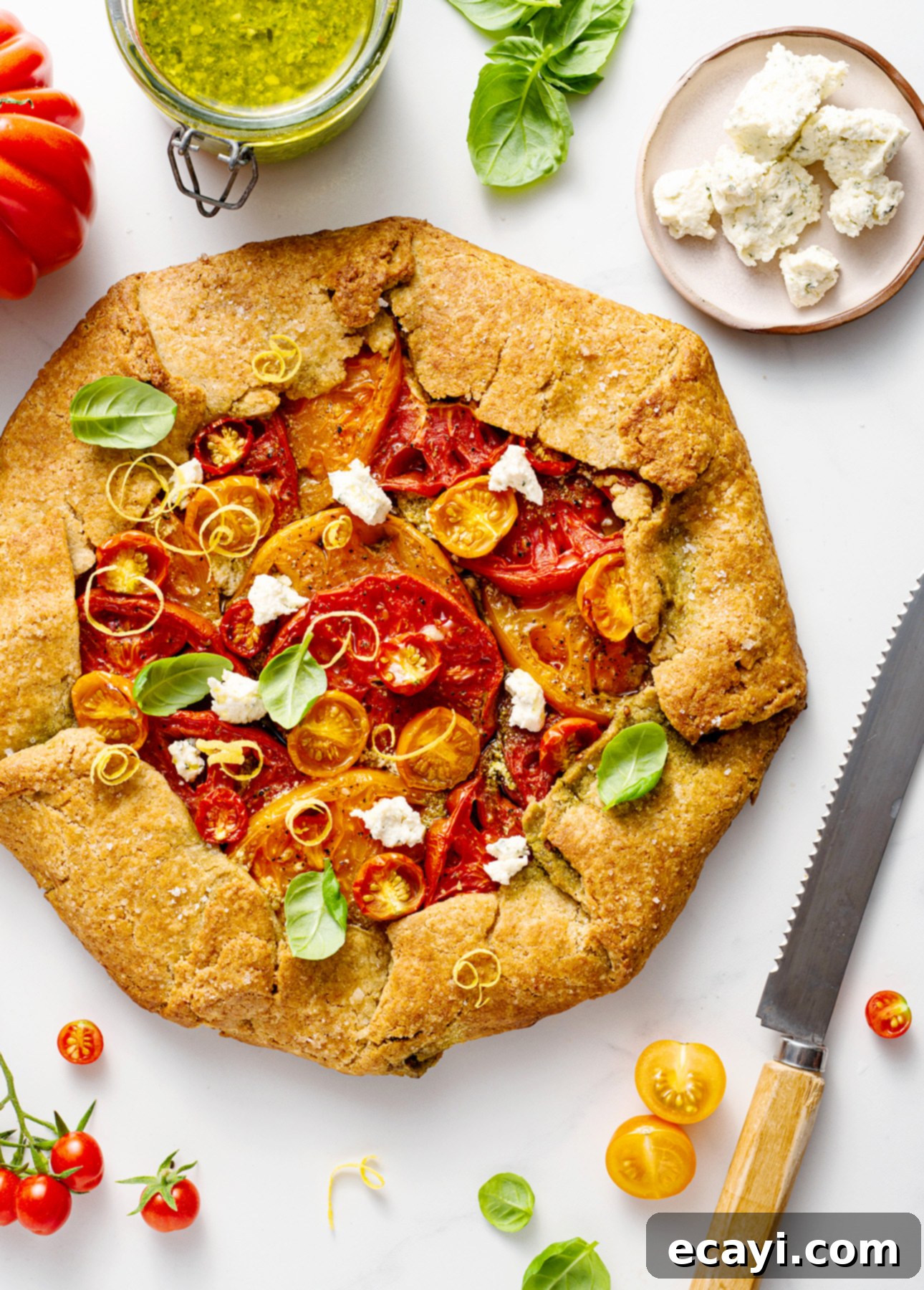 Vibrant Heirloom Tomato Crostata with Handcrafted Pesto 4 Heirloom Tomato Crostata with Homemade Pesto // FoodNouveau.com