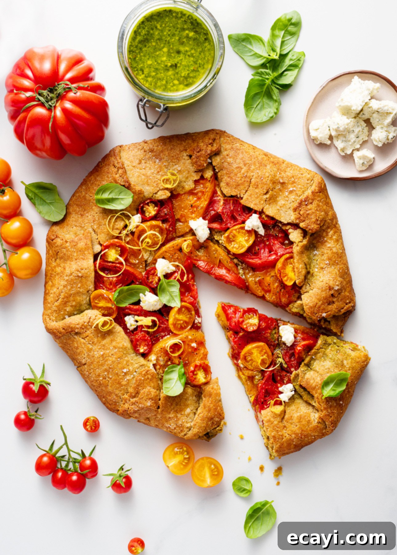 Vibrant Heirloom Tomato Crostata with Handcrafted Pesto 7 Heirloom Tomato Crostata with Homemade Pesto // FoodNouveau.com