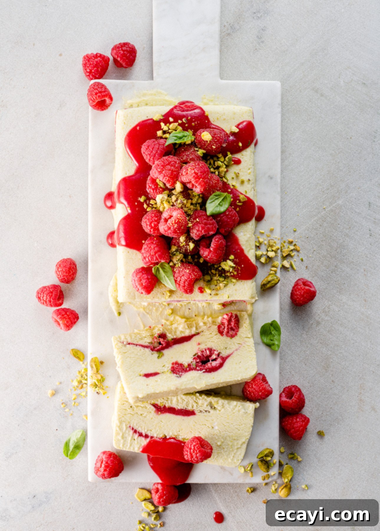 Velvet Raspberry Pistachio Semifreddo 3 Close-up shot of Raspberry Pistachio Semifreddo slice, showing its creamy texture and distinct layers
