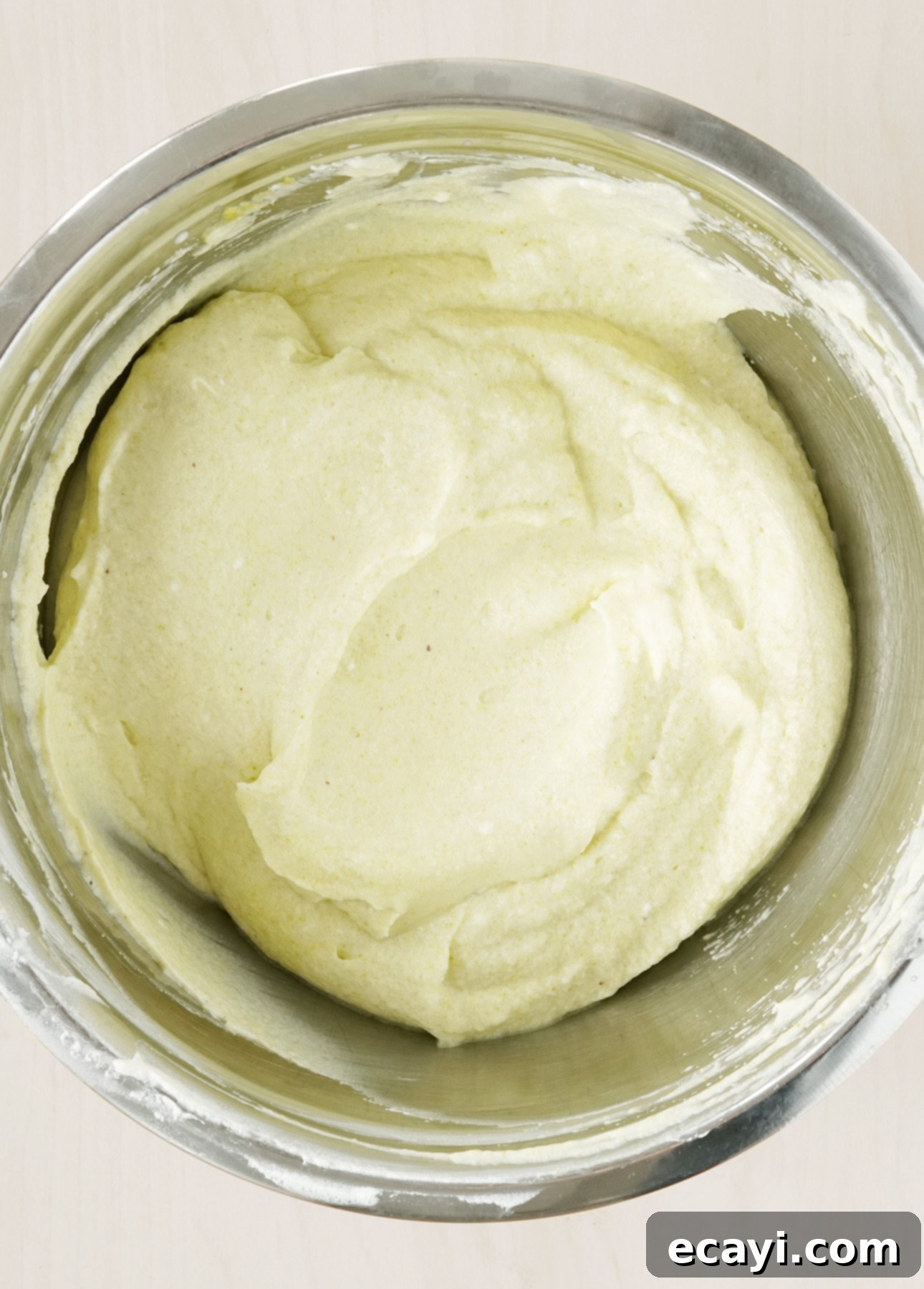 Velvet Raspberry Pistachio Semifreddo 4 Pistachio Semifreddo mixture in a bowl, light green and airy before freezing