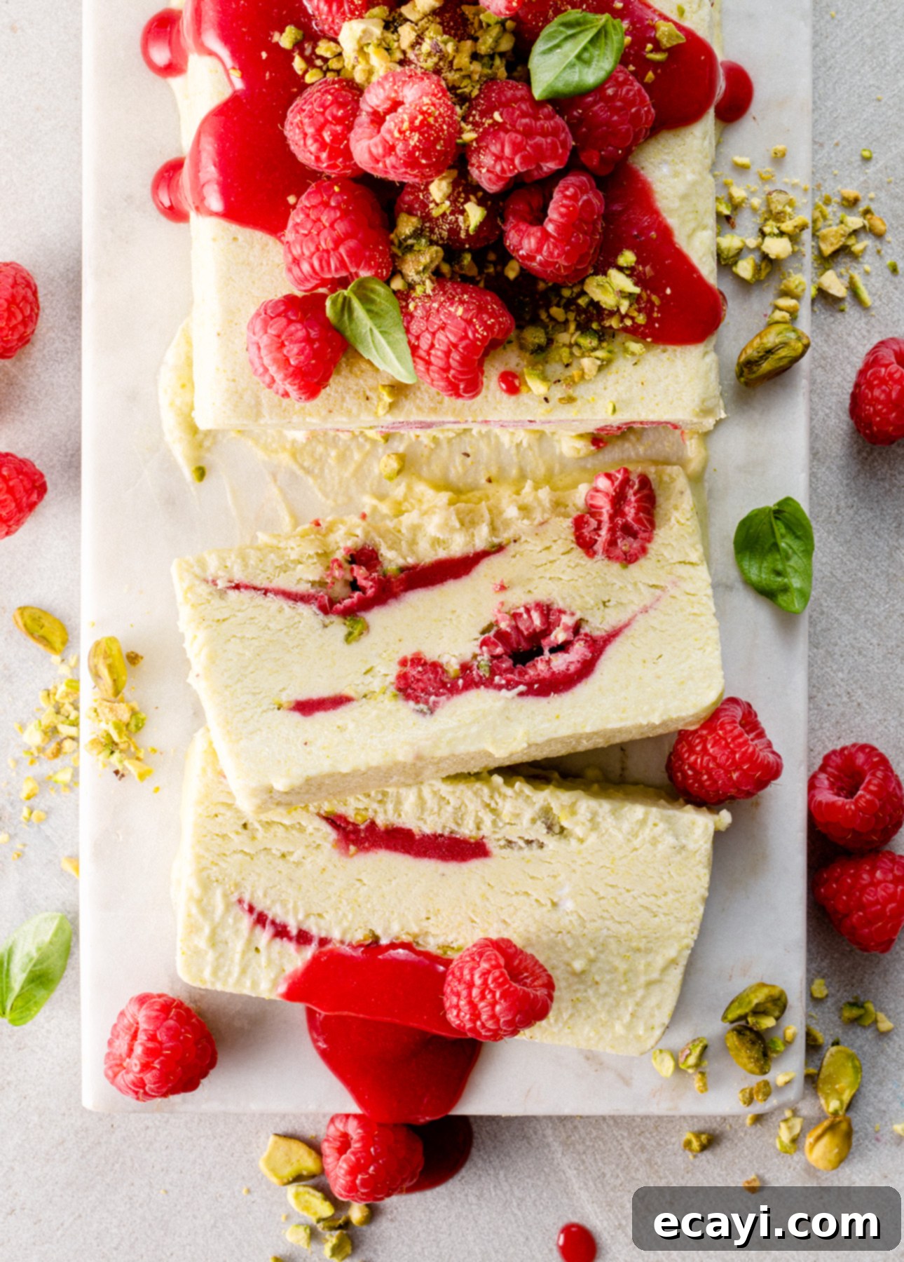 Velvet Raspberry Pistachio Semifreddo 7 A loaf of Raspberry Pistachio Semifreddo, ready to be sliced and served